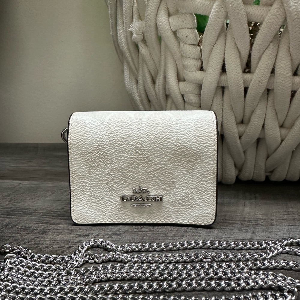 Coach Mini Wallet on a chain in white signature canvas.